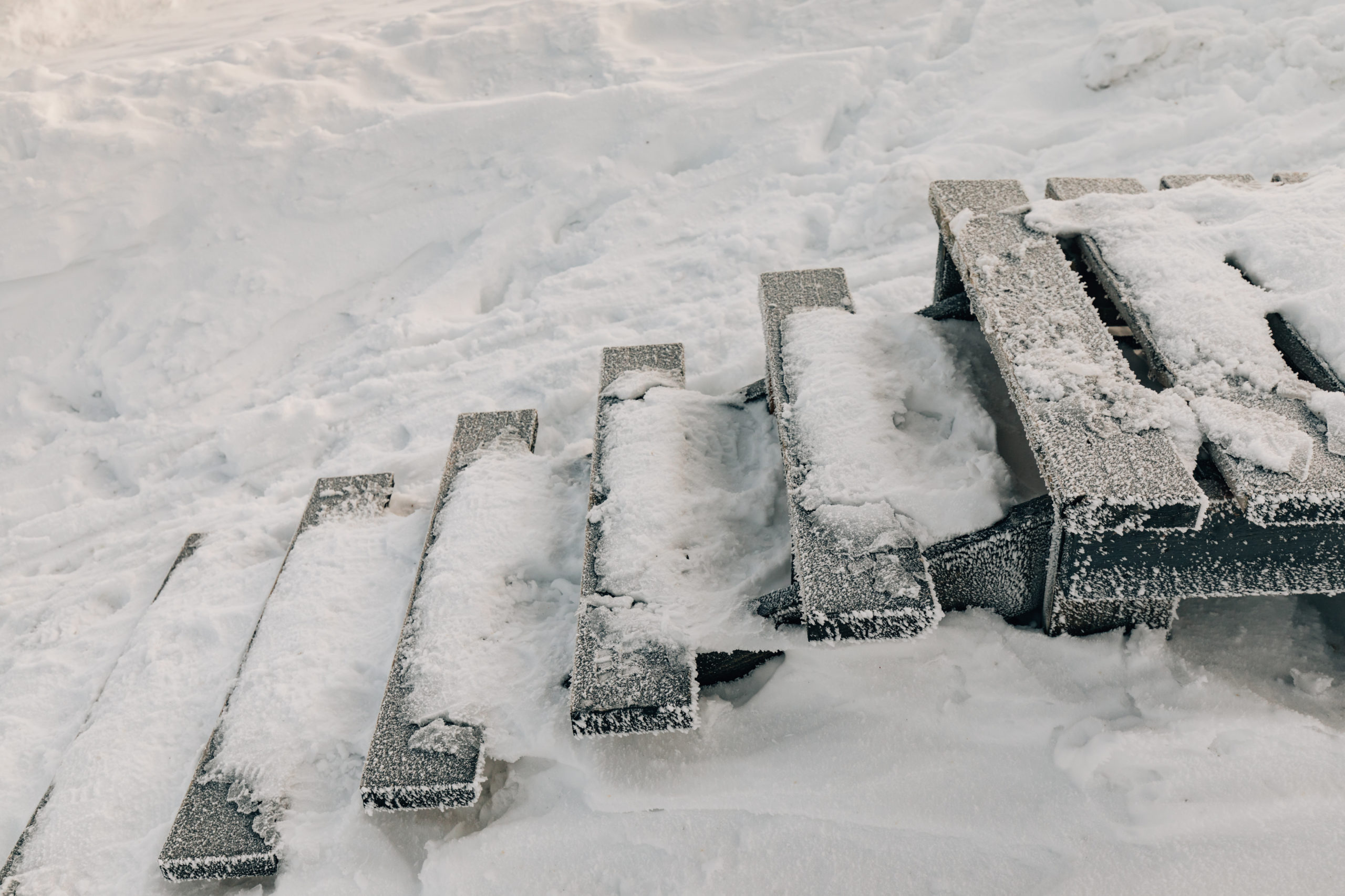 how to melt ice fast on driveway