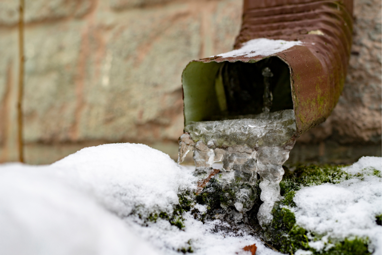 Clearing Icy Gutters With Calcium Chloride