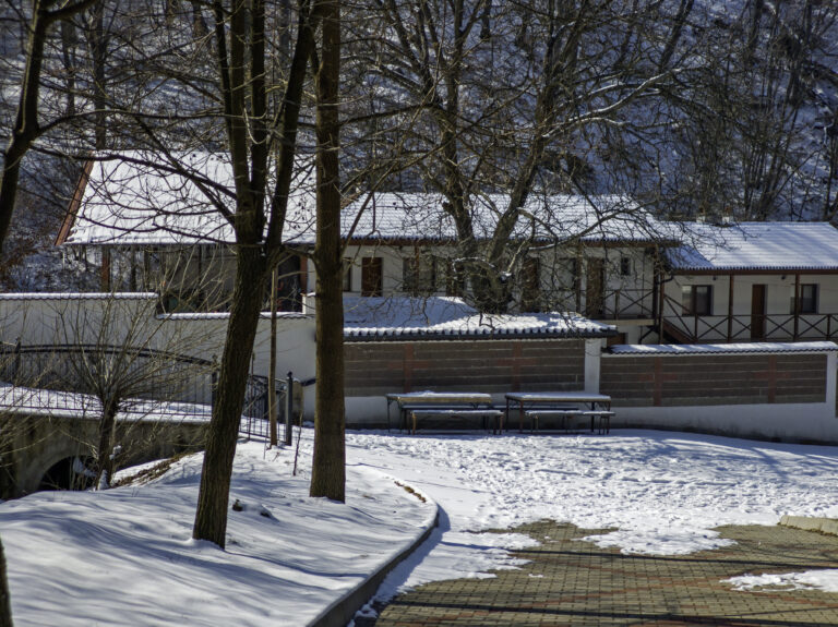 Dark rust stains and water spots on outdoor concrete surface